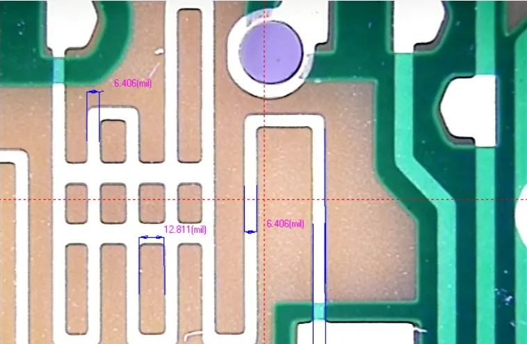 Close-up of PCB traces with minimum trace spacing measurements