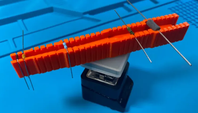 Collection of lead bending tools for component lead forming.