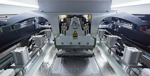 SMT stencil applying solder paste on a PCB for precise assembly