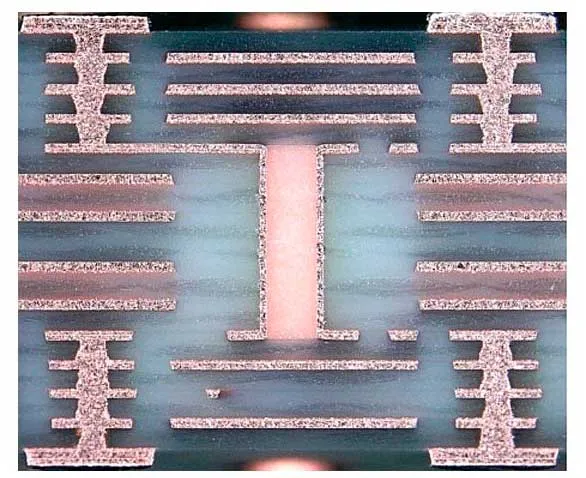 Cross-section of multilayer PCB showing buried vias for signal integrity.