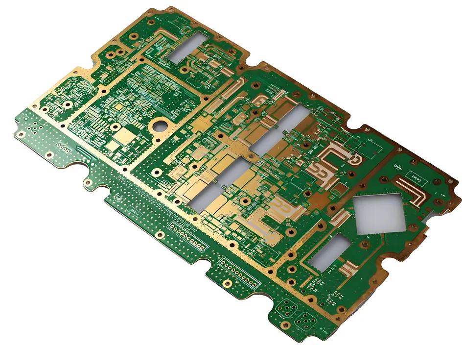 Close-up of PCB with green solder mask layer and exposed copper pads.