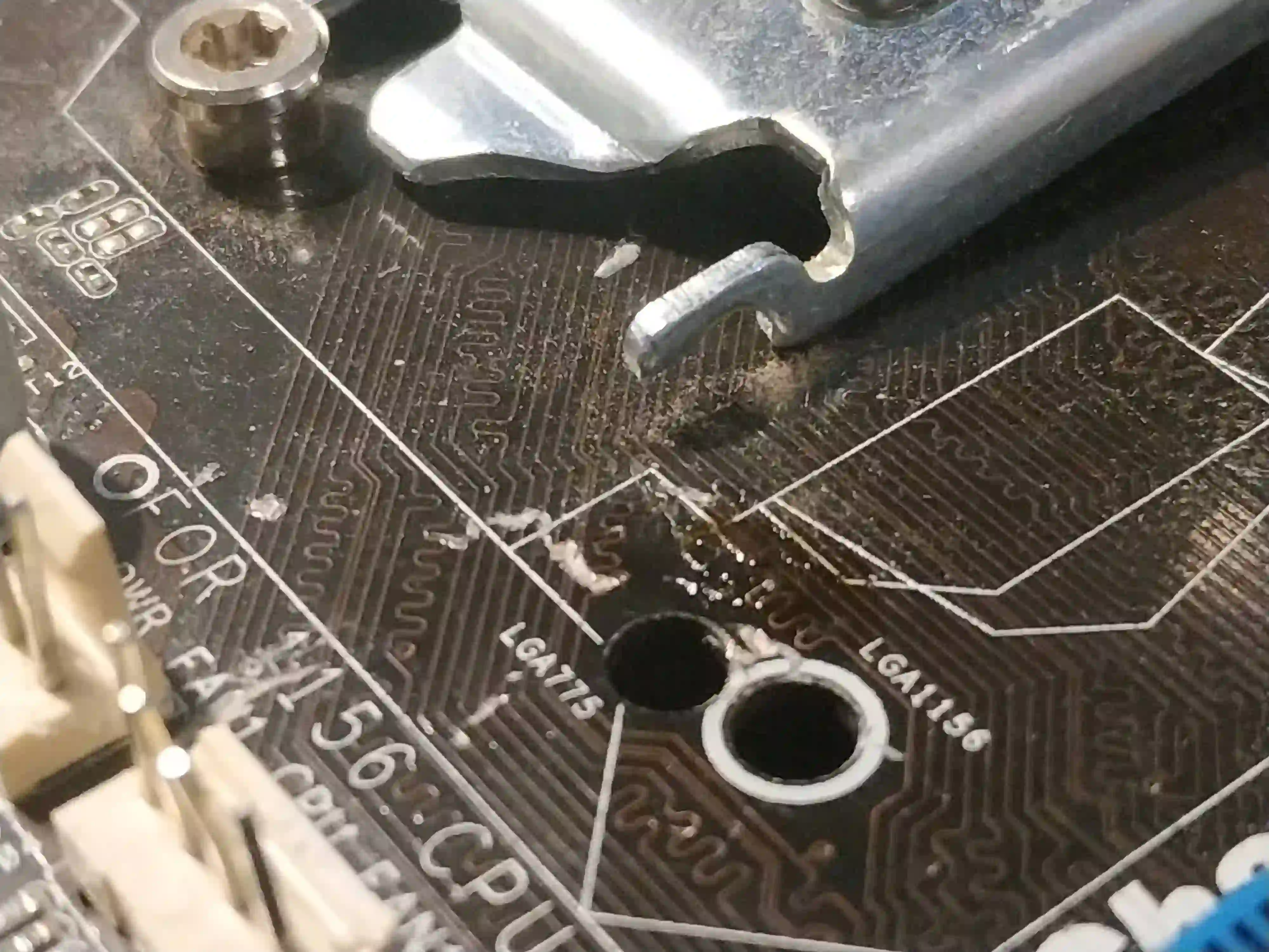 Close-up of a micro-crack in a PCB trace under magnification