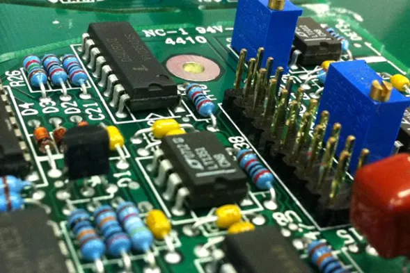Through-hole solar PCB components soldered for durability
