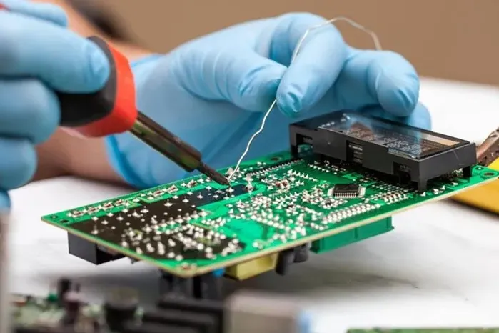 Through-hole component soldering on G-10 PCB