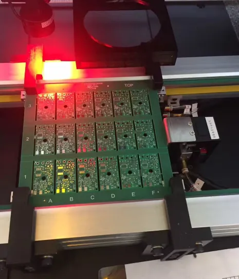 Laser depaneling machine cutting PCB panel"