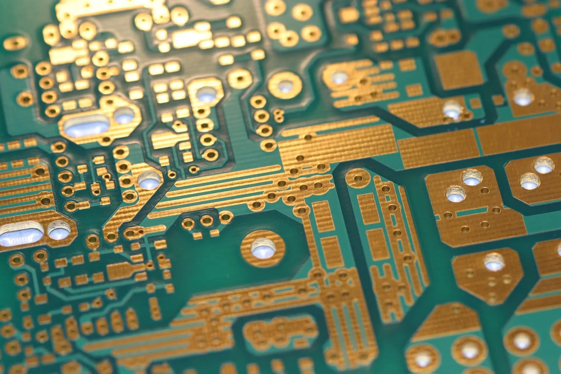 Finished PCB rework with solder mask removed and copper traces exposed.