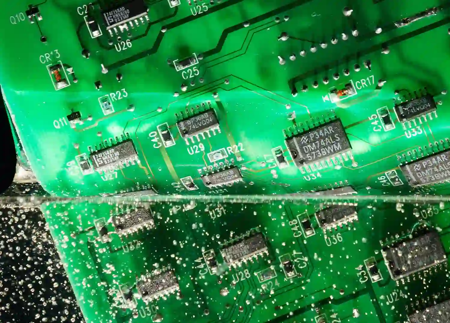 Robust PCB with conformal coating for power tool charger durability.
