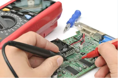 "Identifying Short Circuit on E-Reader PCB with Burnt Trace"