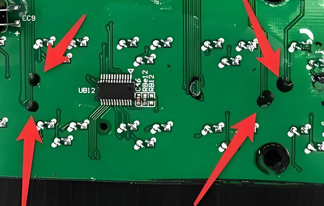 Fiberglass weave in PCB showing wet weaving defect.