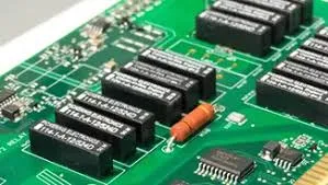 Through hole PCB assembly with durable components for IoT devices