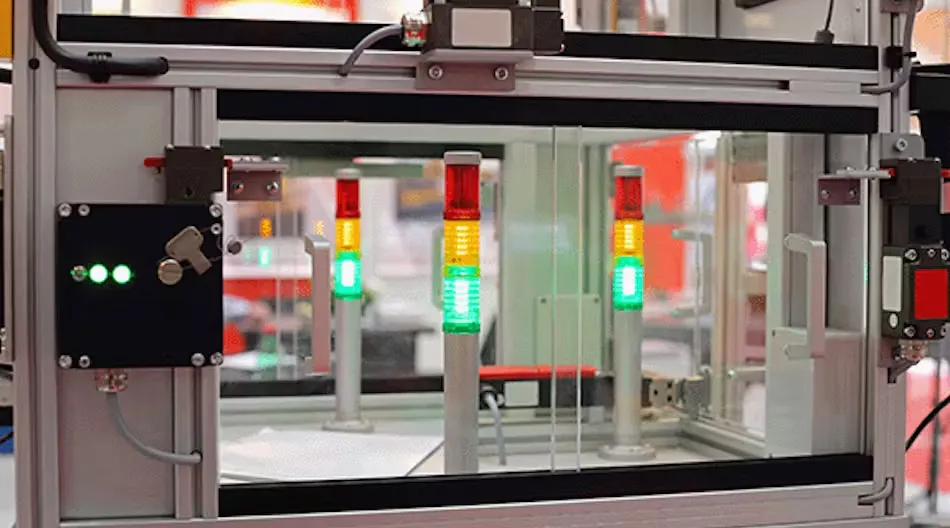 Industrial stack light with red, yellow, and green indicators for automation status