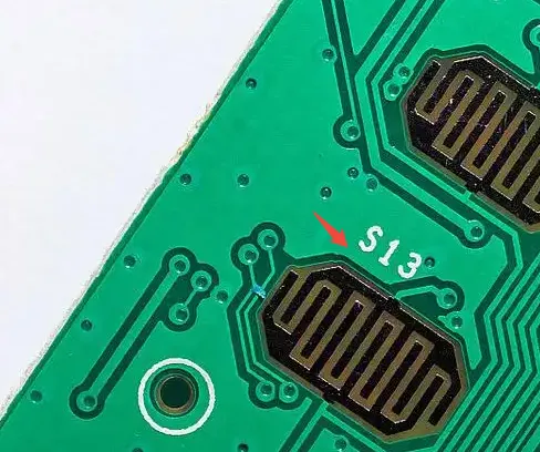 PCB showing clear separation between solder mask and silkscreen labels.