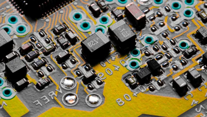 Infotainment system PCB with labeled components for design troubleshooting