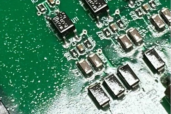 Water-based conformal coating application on a PCB