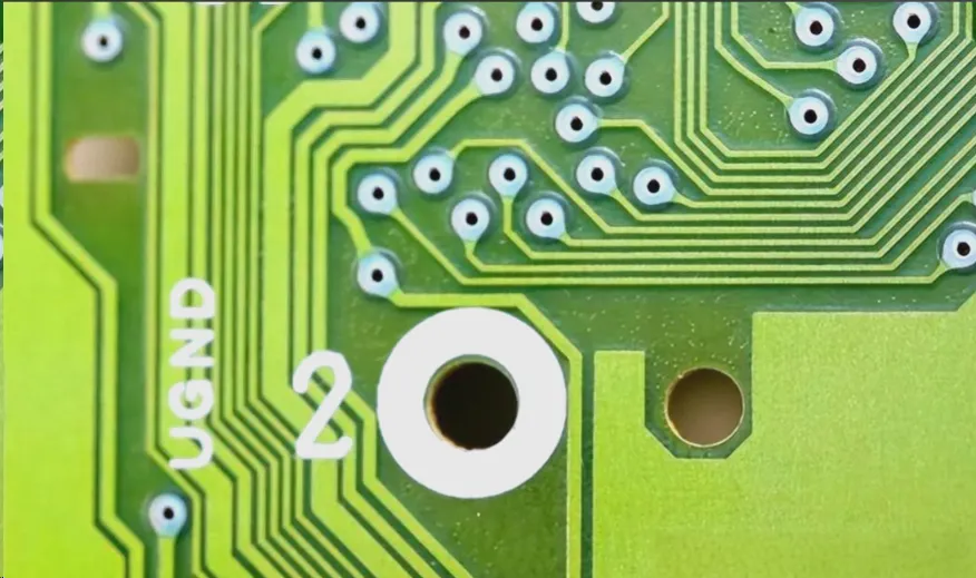 PCB layout with via stitching and separated analog-digital grounds.