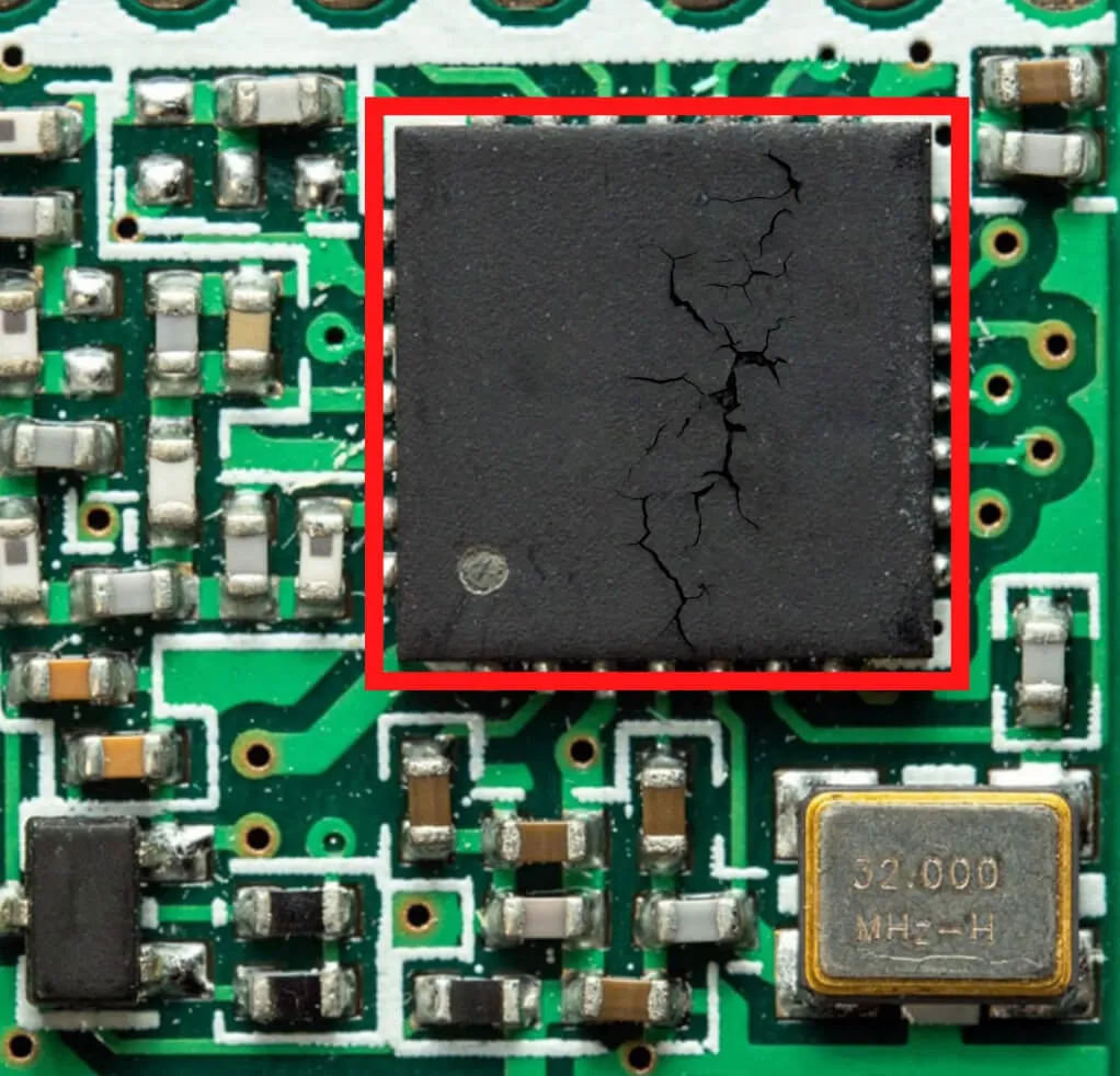 Damaged PCB showing burnt components and cracks for failure analysis