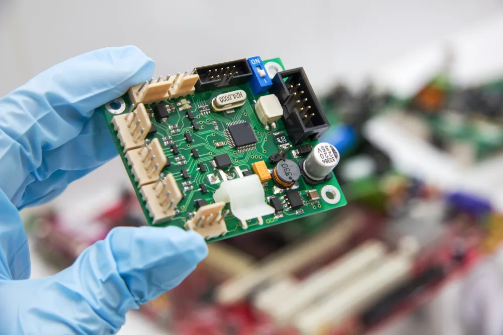 Encapsulated component board with Parylene coating for implantable medical PCB reliability