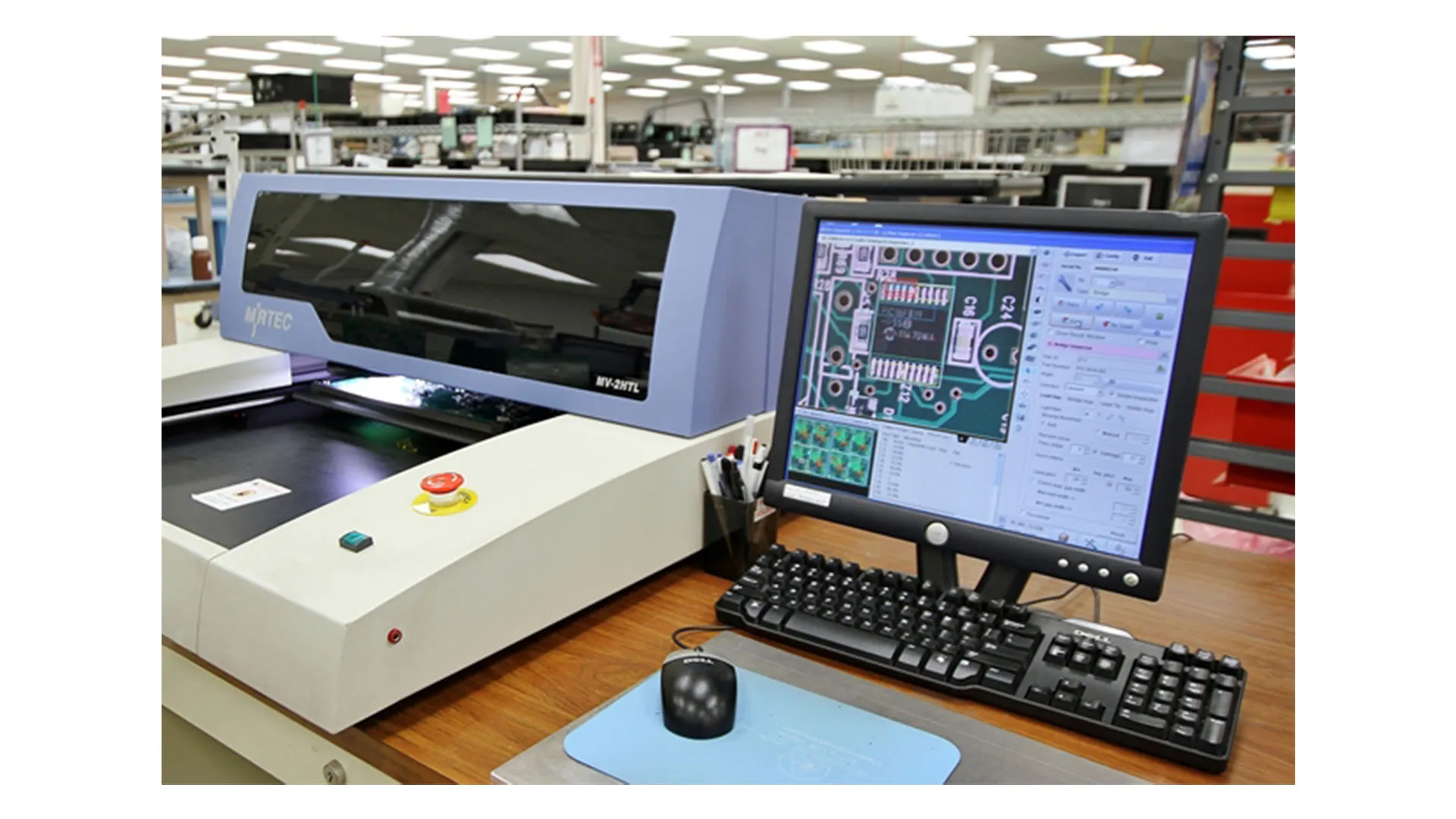 Automated optical inspection system scanning PCB for legend printing defects.