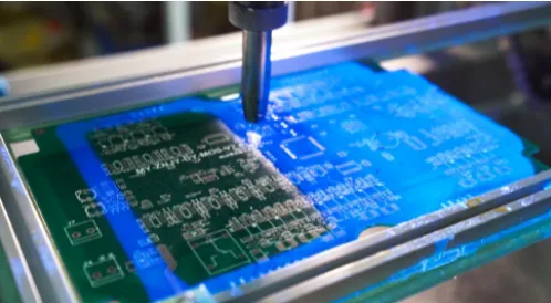 Close-up of conformal coating applied to a high-frequency Rogers PCB for moisture protection