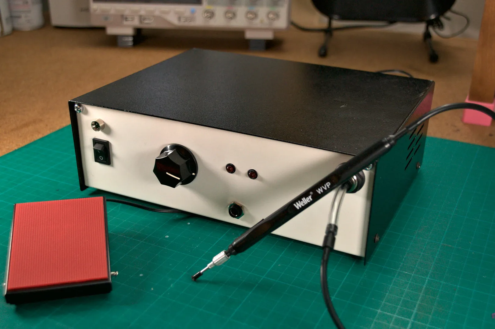 Vacuum pick tool lifting an SMD component for SMT assembly.
