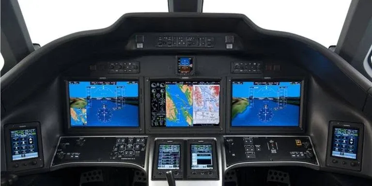 Modern aircraft cockpit with digital displays powered by precision PCBs