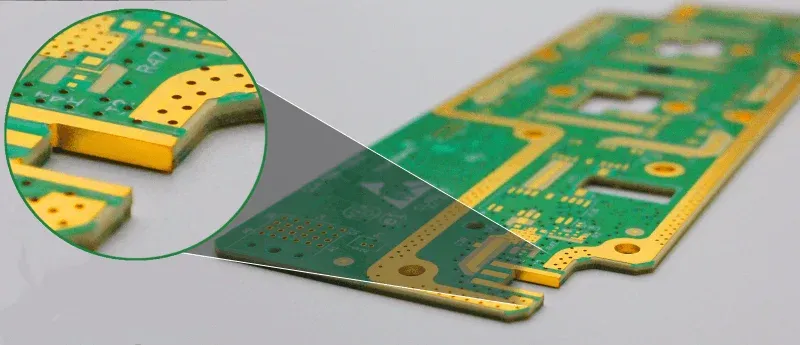 Close-up view of PCB edge plating for electrical conductivity and shielding
