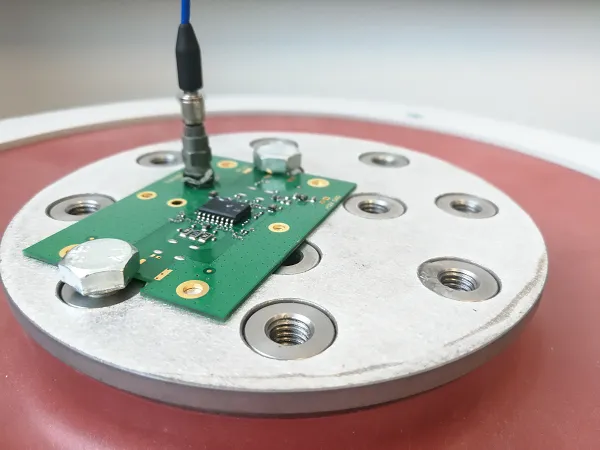 Vibration testing for rugged construction equipment PCBs."