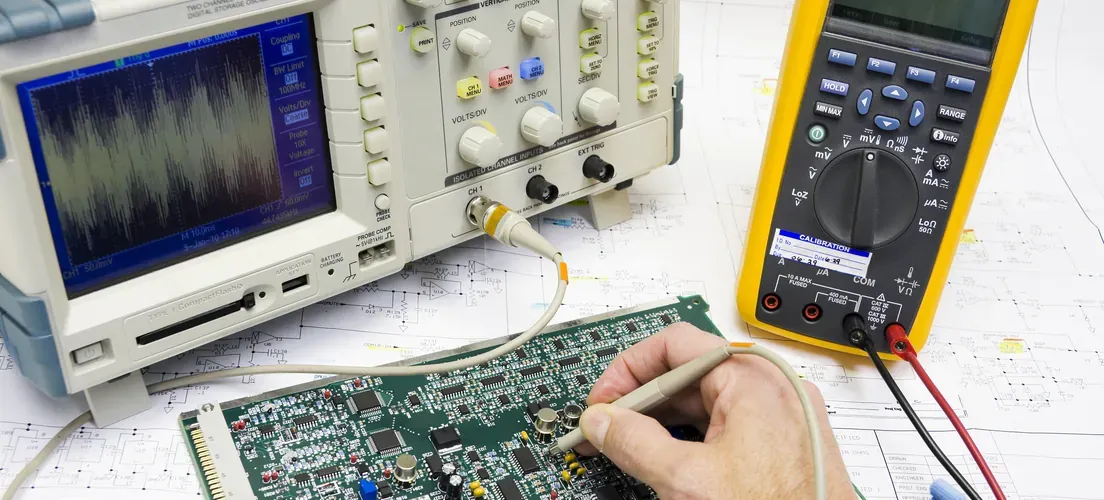 Technician conducting ESD audit in PCB manufacturing