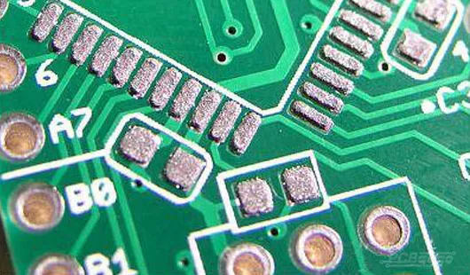 Microscopic view of solder paste on fine-pitch PCB pads