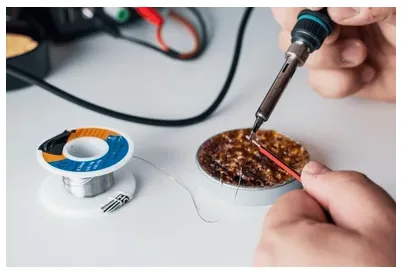 Rosin flux and soldering tools for vintage electronics repair