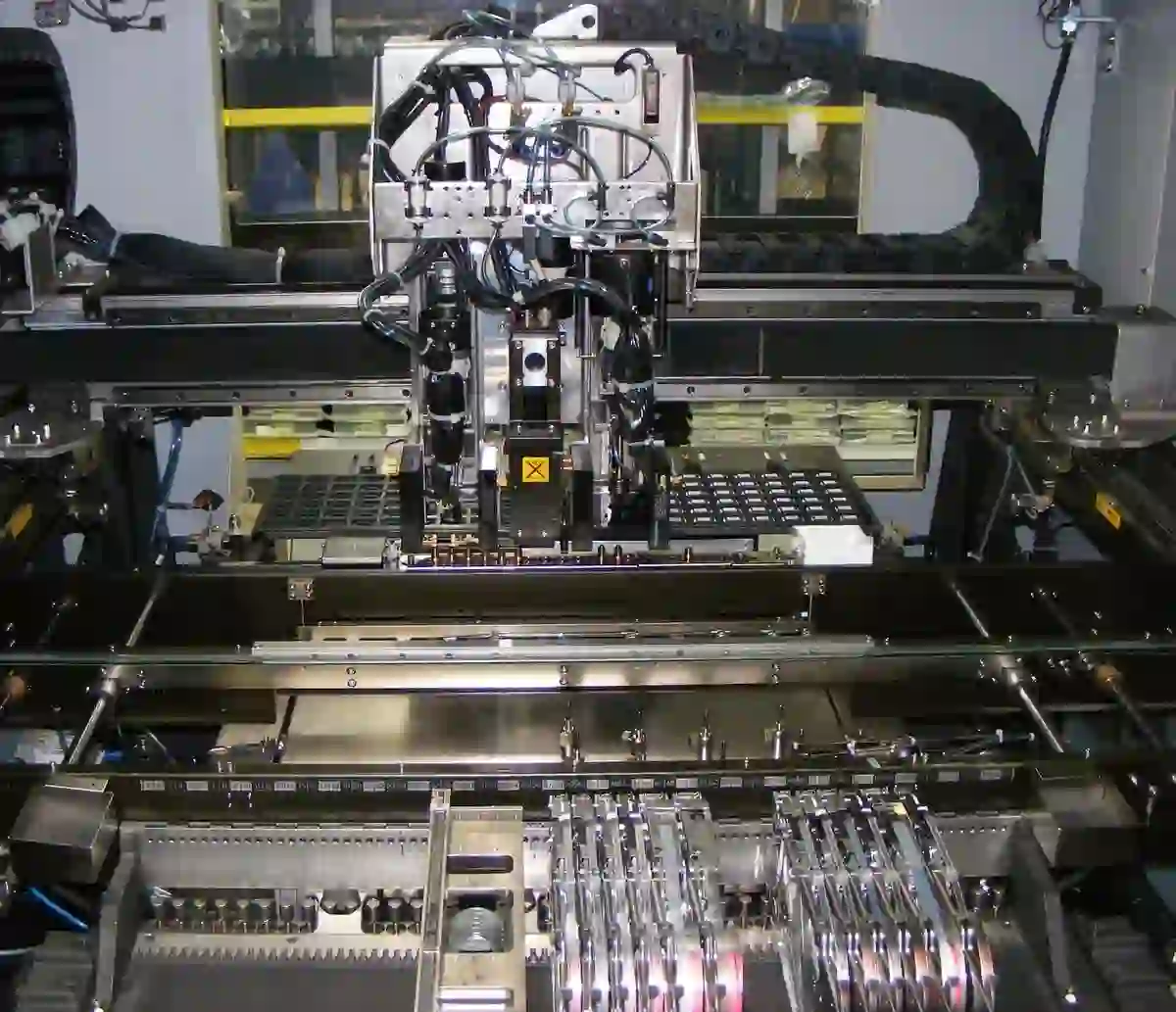 Pick-and-place machine during automatic PCB assembly with proper spacing.