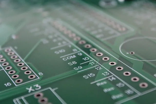 Close-up of G-10 PCB showcasing fiberglass laminate and mounted components