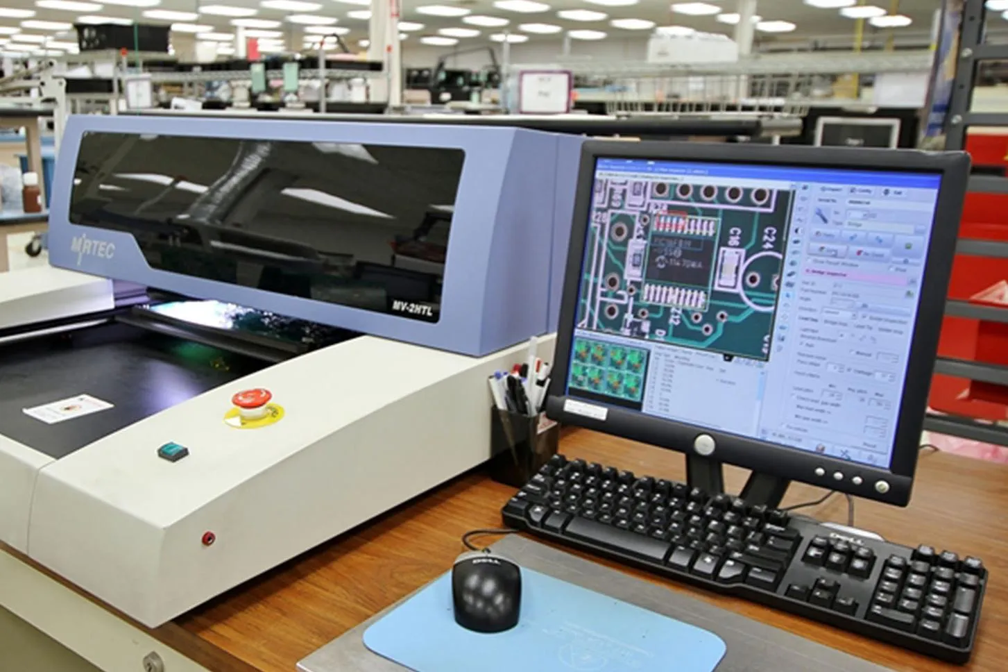 Quality control inspection of hybrid PCB assembly using advanced testing equipment.