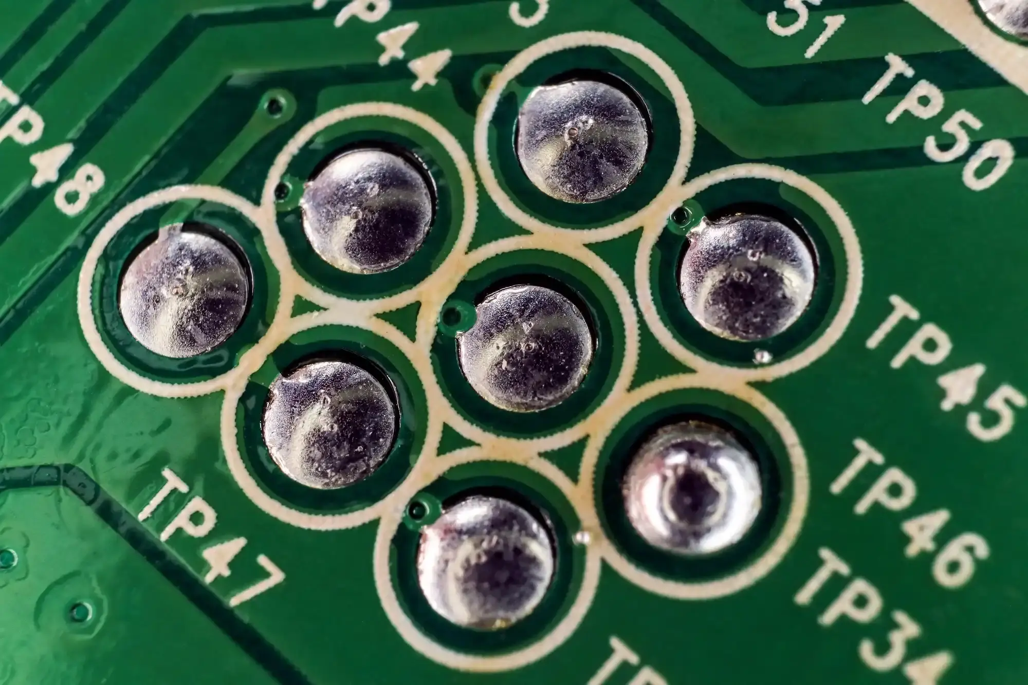 Microscopic view of solder joints on MRI PCB with ENIG surface finish."
