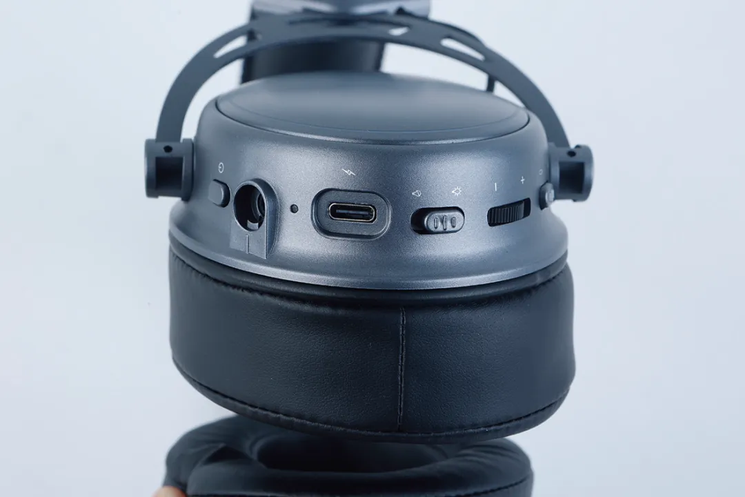 Left earcup houses controls, switches, and ports