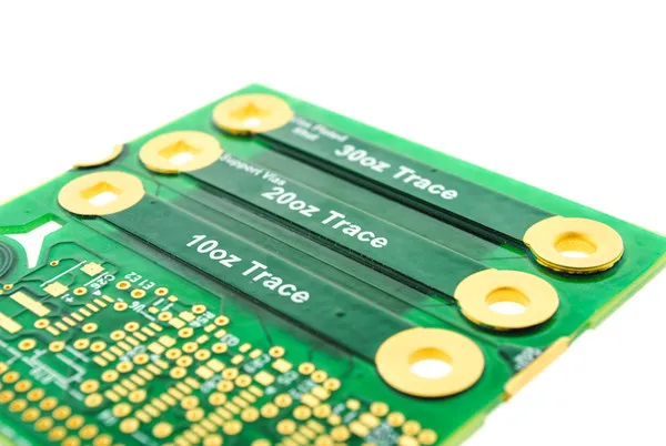 Close-up of PCB copper traces with varying thicknesses.