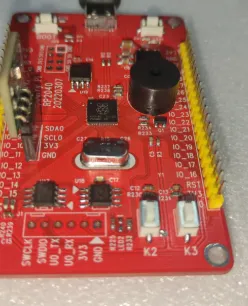 Bulging capacitor on hotel room control PCB indicating failure.