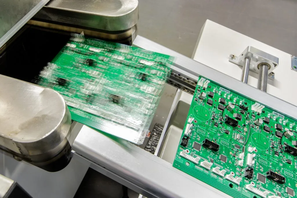 Wave soldering process for marine PCB through-hole assembly.