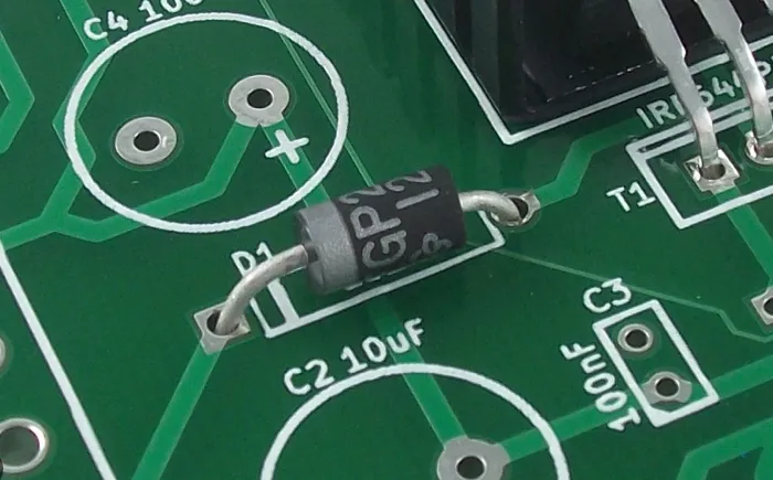 Close-up of PCB silkscreen markings for component identification and troubleshooting