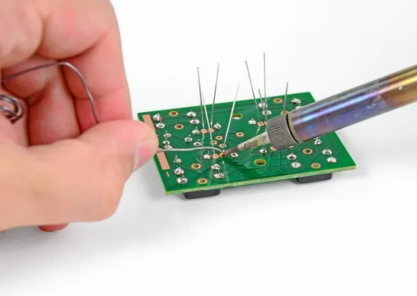 PCB with trimmed leads following lead cutting best practices