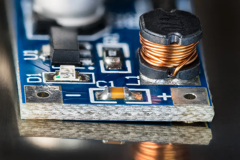 Inductor component on a printed circuit board for electronic design.