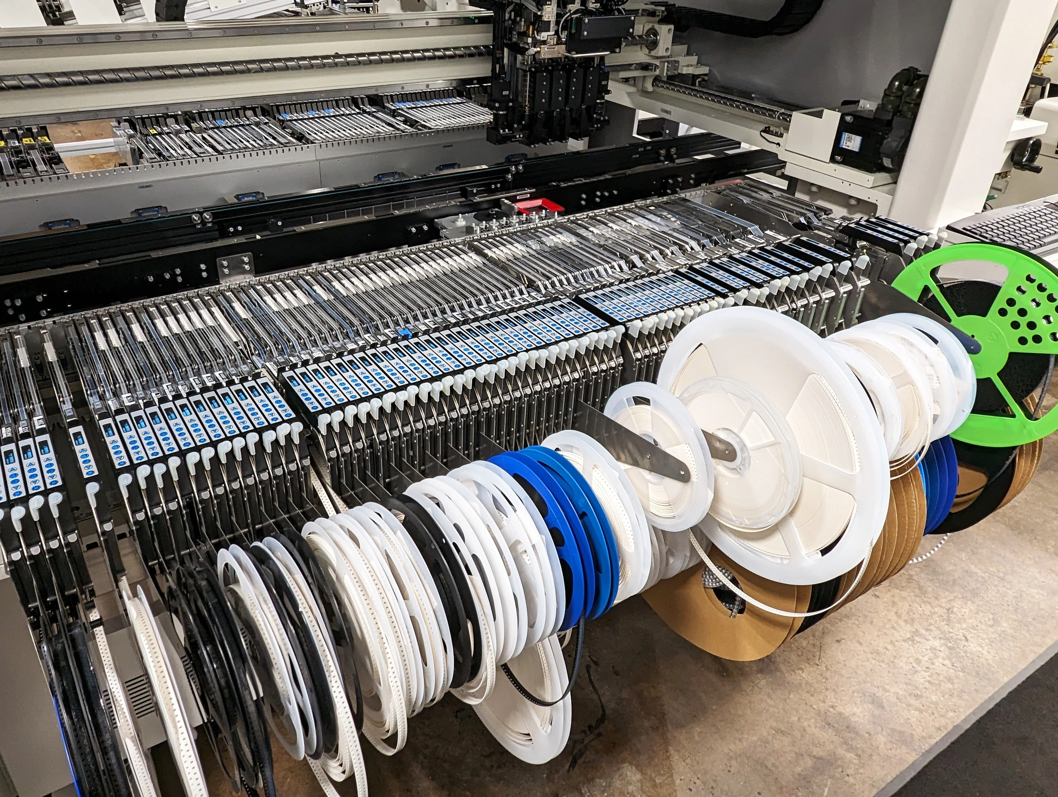 SMT component feeder on pick and place machine for PCB assembly