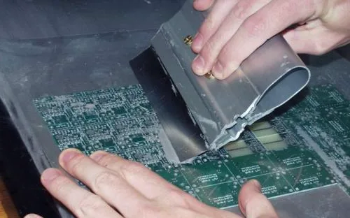 Applying solder paste to double-sided PCB with stencil