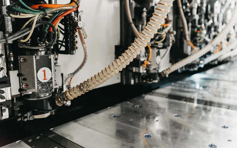 PCB manufacturing setup for drilling blind and buried vias with high-performance materials.